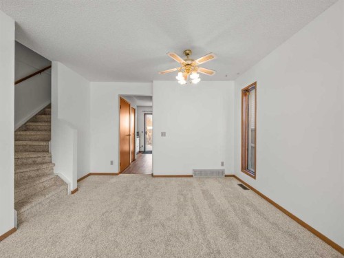 10 Martinbrook Road Ne, Calgary, AB - Indoor Photo Showing Other Room