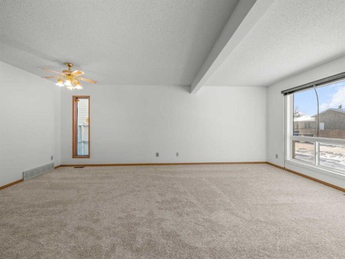 10 Martinbrook Road Ne, Calgary, AB - Indoor Photo Showing Other Room