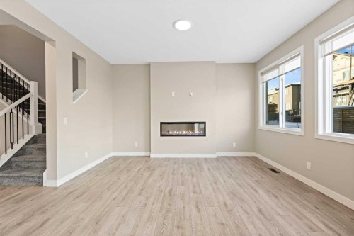 164 Wolf River Drive Se, Calgary, AB - Indoor With Fireplace
