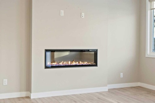 164 Wolf River Drive Se, Calgary, AB - Indoor With Fireplace
