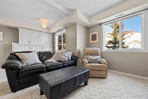 3249-1818 Simcoe Boulevard Sw, Calgary, AB - Indoor Photo Showing Living Room
