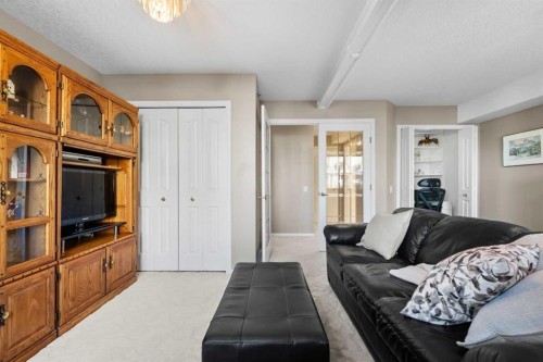 3249-1818 Simcoe Boulevard Sw, Calgary, AB - Indoor Photo Showing Living Room