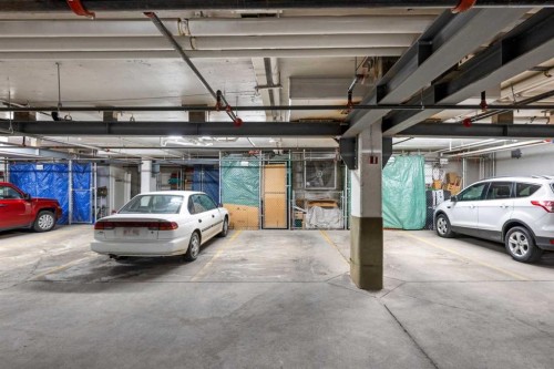 3249-1818 Simcoe Boulevard Sw, Calgary, AB - Indoor Photo Showing Garage