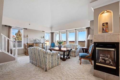 3249-1818 Simcoe Boulevard Sw, Calgary, AB - Indoor Photo Showing Living Room With Fireplace