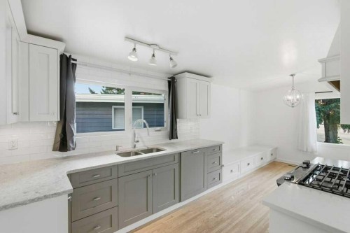 3124 Leduc Crescent Sw, Calgary, AB - Indoor Photo Showing Kitchen With Double Sink