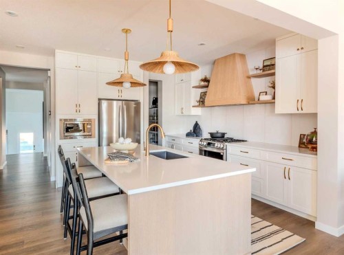 4063 Sawgrass Street Nw, Airdrie, AB - Indoor Photo Showing Kitchen With Upgraded Kitchen