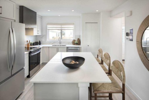 19765 45 Street Se, Calgary, AB - Indoor Photo Showing Kitchen With Stainless Steel Kitchen With Upgraded Kitchen