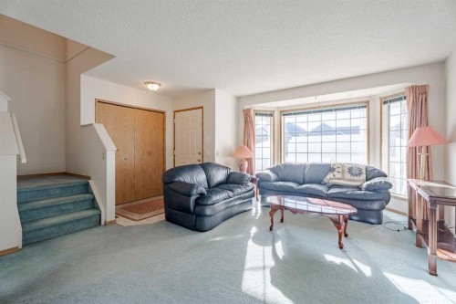 82 Martinridge Crescent Ne, Calgary, AB - Indoor Photo Showing Living Room