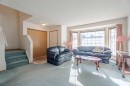 82 Martinridge Crescent Ne, Calgary, AB  - Indoor Photo Showing Living Room 