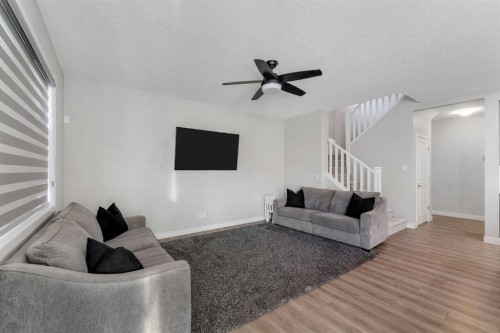 39 Savanna Way Ne, Calgary, AB - Indoor Photo Showing Living Room