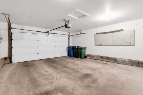 155 Lakeview Cove, Chestermere, AB - Indoor Photo Showing Garage