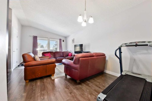 1141 35 Street Se, Calgary, AB - Indoor Photo Showing Other Room With Fireplace