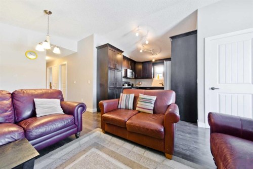 1141 35 Street Se, Calgary, AB - Indoor Photo Showing Living Room