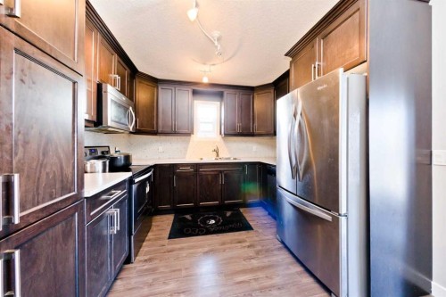 1141 35 Street Se, Calgary, AB - Indoor Photo Showing Kitchen With Double Sink