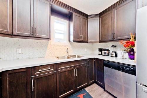 1141 35 Street Se, Calgary, AB - Indoor Photo Showing Kitchen With Double Sink