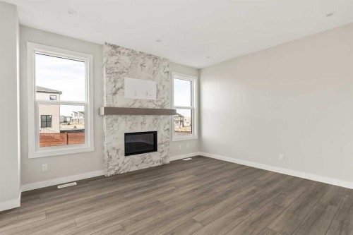 268 Calhoun Crescent Ne, Calgary, AB - Indoor Photo Showing Living Room With Fireplace