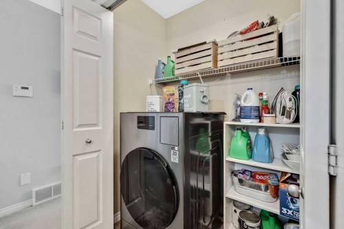 155 Cimarron Grove Circle, Okotoks, AB - Indoor Photo Showing Laundry Room