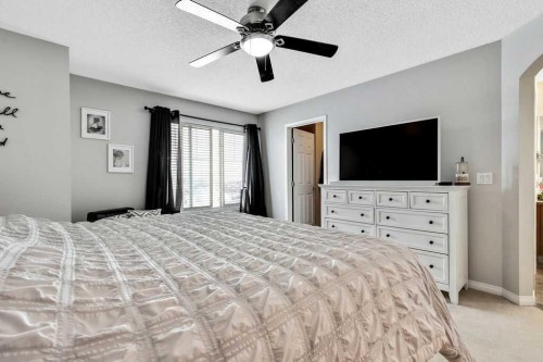 155 Cimarron Grove Circle, Okotoks, AB - Indoor Photo Showing Bedroom