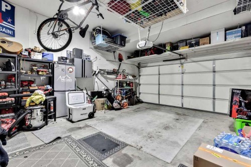 155 Cimarron Grove Circle, Okotoks, AB - Indoor Photo Showing Garage