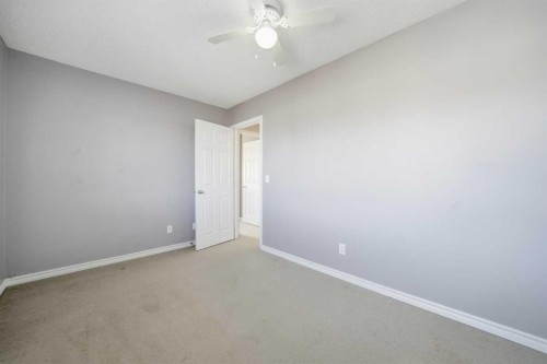 155 Cimarron Grove Circle, Okotoks, AB - Indoor Photo Showing Other Room