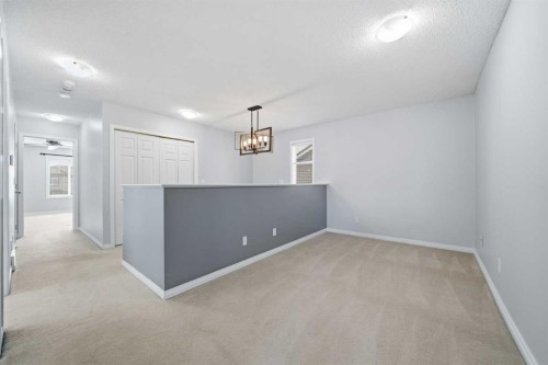 155 Cimarron Grove Circle, Okotoks, AB - Indoor Photo Showing Other Room