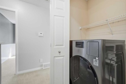155 Cimarron Grove Circle, Okotoks, AB - Indoor Photo Showing Laundry Room