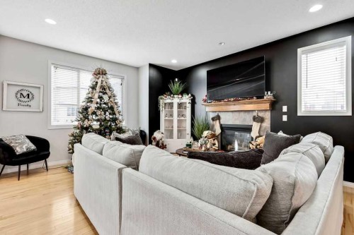 155 Cimarron Grove Circle, Okotoks, AB - Indoor Photo Showing Living Room With Fireplace