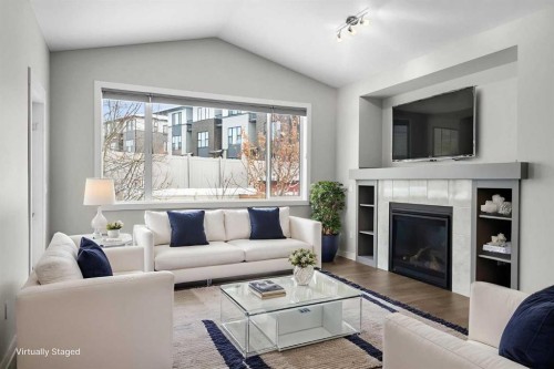 136 Drake Landing Gardens, Okotoks, AB - Indoor Photo Showing Living Room With Fireplace