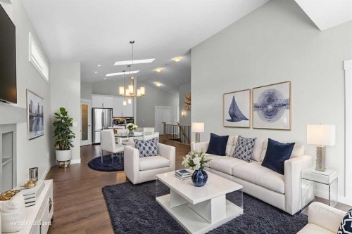 136 Drake Landing Gardens, Okotoks, AB - Indoor Photo Showing Living Room