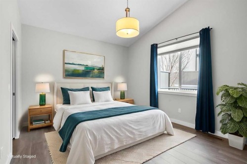136 Drake Landing Gardens, Okotoks, AB - Indoor Photo Showing Bedroom