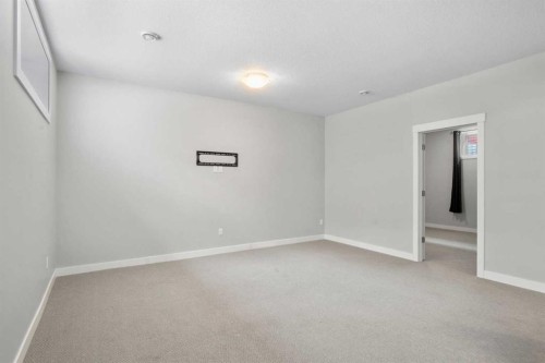 136 Drake Landing Gardens, Okotoks, AB - Indoor Photo Showing Other Room
