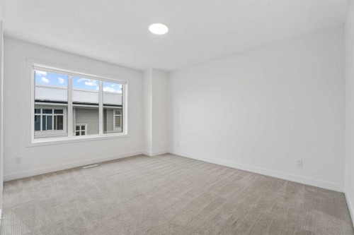 528-857 Belmont Drive Sw, Calgary, AB - Indoor Photo Showing Other Room
