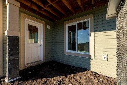 83 Saddlebred Place, Cochrane, AB - Outdoor With Deck Patio Veranda With Exterior