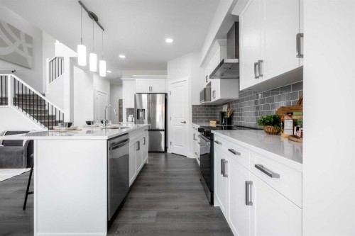 83 Saddlebred Place, Cochrane, AB - Indoor Photo Showing Kitchen With Upgraded Kitchen