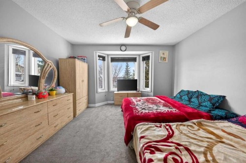 214 Martinwood Place Ne, Calgary, AB - Indoor Photo Showing Bedroom