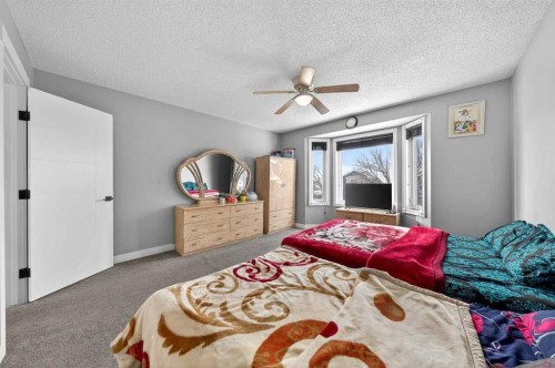 214 Martinwood Place Ne, Calgary, AB - Indoor Photo Showing Bedroom