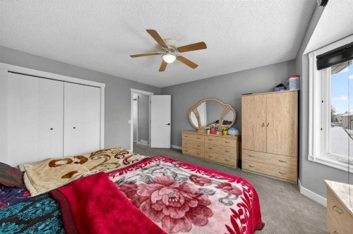 214 Martinwood Place Ne, Calgary, AB - Indoor Photo Showing Bedroom