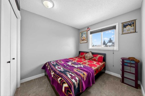 214 Martinwood Place Ne, Calgary, AB - Indoor Photo Showing Bedroom