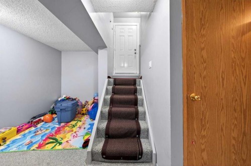 214 Martinwood Place Ne, Calgary, AB - Indoor Photo Showing Other Room