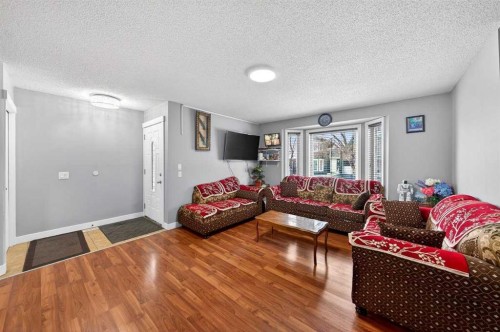 214 Martinwood Place Ne, Calgary, AB - Indoor Photo Showing Living Room