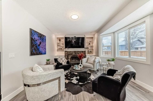 343 Deer Side Place Se, Calgary, AB - Indoor With Fireplace