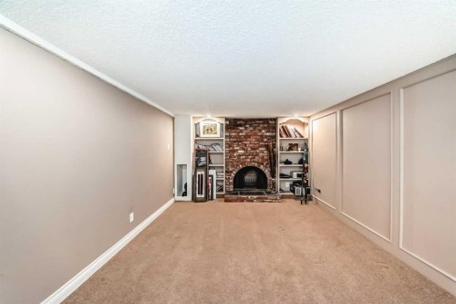 343 Deer Side Place Se, Calgary, AB - Indoor With Fireplace