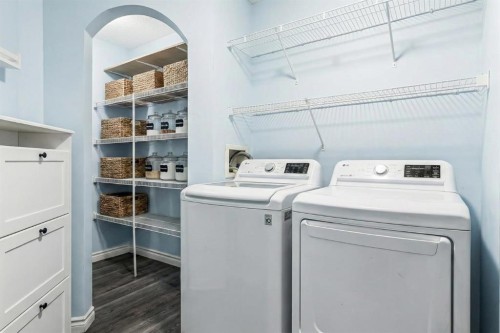 94 New Brighton Circle Se, Calgary, AB - Indoor Photo Showing Laundry Room