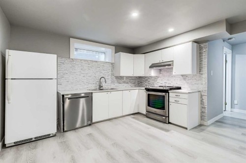 94 New Brighton Circle Se, Calgary, AB - Indoor Photo Showing Kitchen With Stainless Steel Kitchen With Upgraded Kitchen