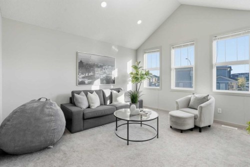 91 Evanscrest Way Nw, Calgary, AB - Indoor Photo Showing Living Room