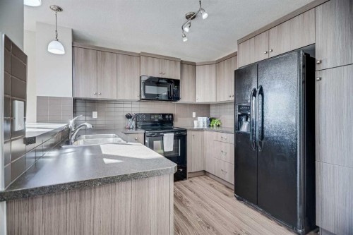 79 Cityscape Gate Ne, Calgary, AB - Indoor Photo Showing Kitchen With Double Sink