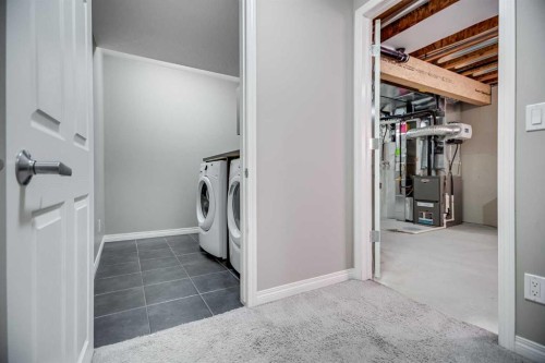 79 Cityscape Gate Ne, Calgary, AB - Indoor Photo Showing Laundry Room