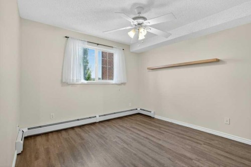 4316-10 Prestwick Bay Se, Calgary, AB - Indoor Photo Showing Other Room