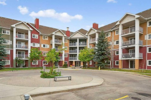 4316-10 Prestwick Bay Se, Calgary, AB - Outdoor With Balcony With Facade