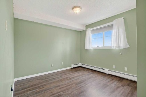 4316-10 Prestwick Bay Se, Calgary, AB - Indoor Photo Showing Other Room